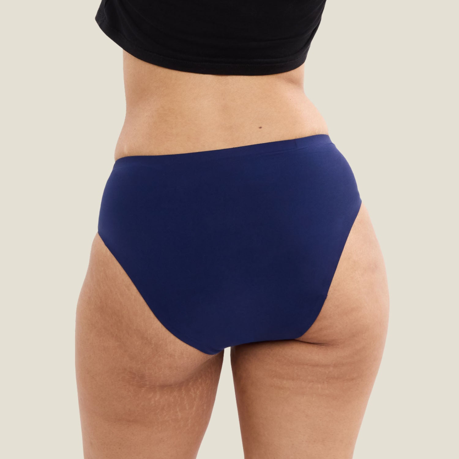 Back view of WUKA Teen Stretch™ Super Heavy Flow navy period pants for teens, demonstrating full coverage and discreet design.