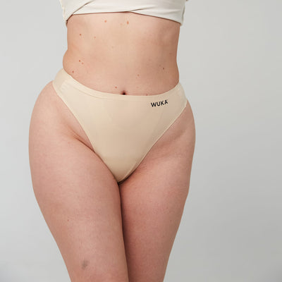 WUKA Stretch Thong Style Light to Medium Absorbency Light Nude Colour Front Size 2
