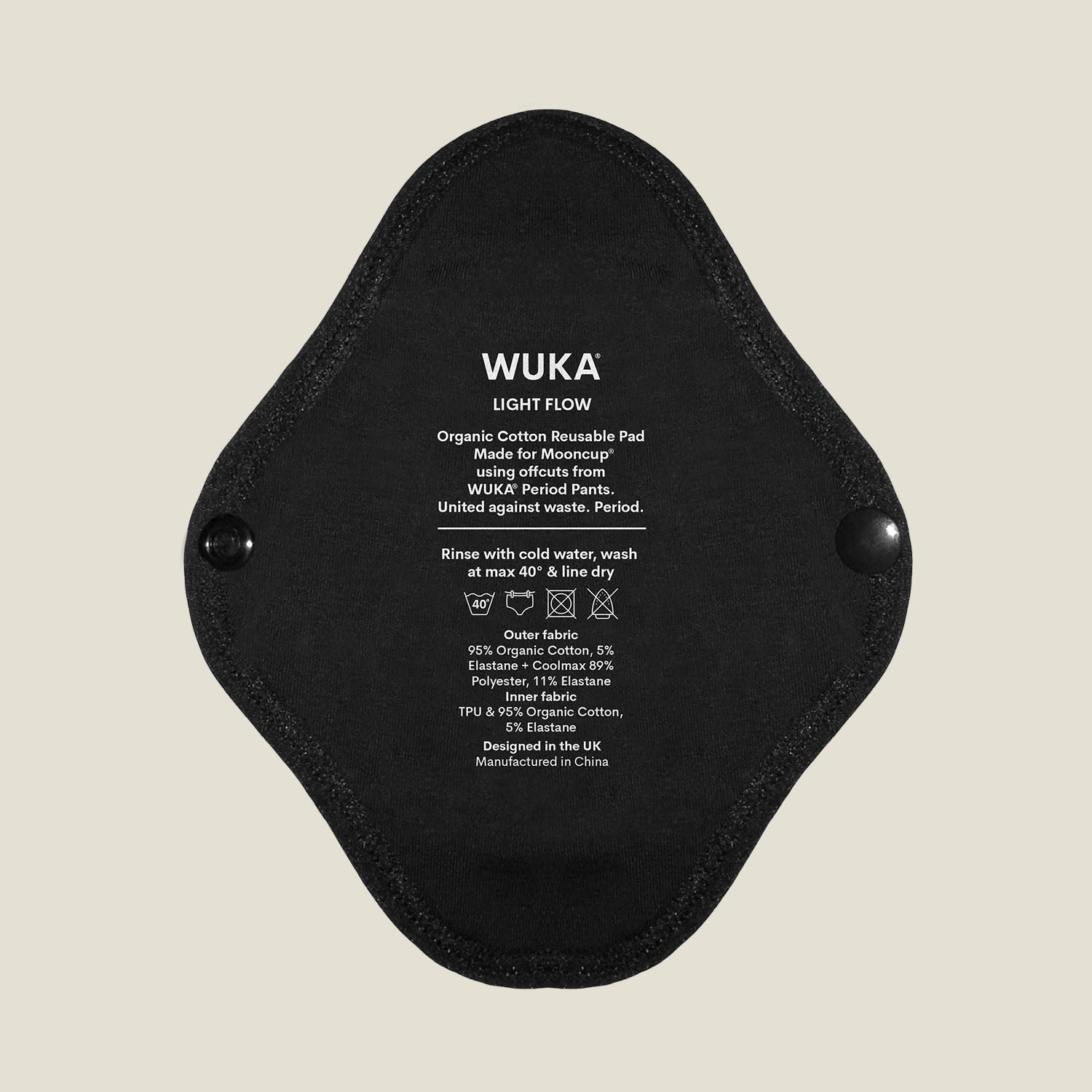 WUKA x Mooncup reusable panty liner for light flow with printed care instructions, made using soft and breathable organic cotton for daily comfort.