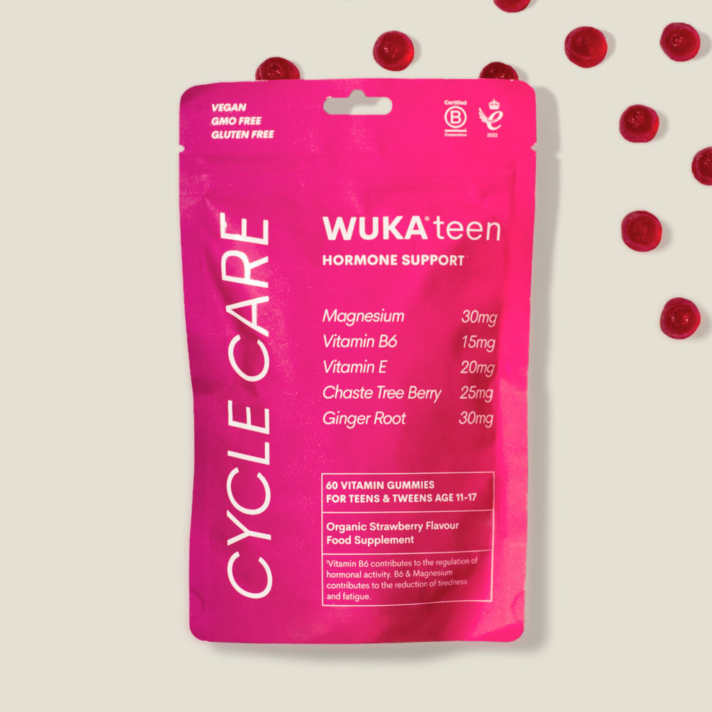Packaging of WUKA Teen Hormone Support Gummies with ingredients and strawberry gummies shown, ideal hormone support for teens.