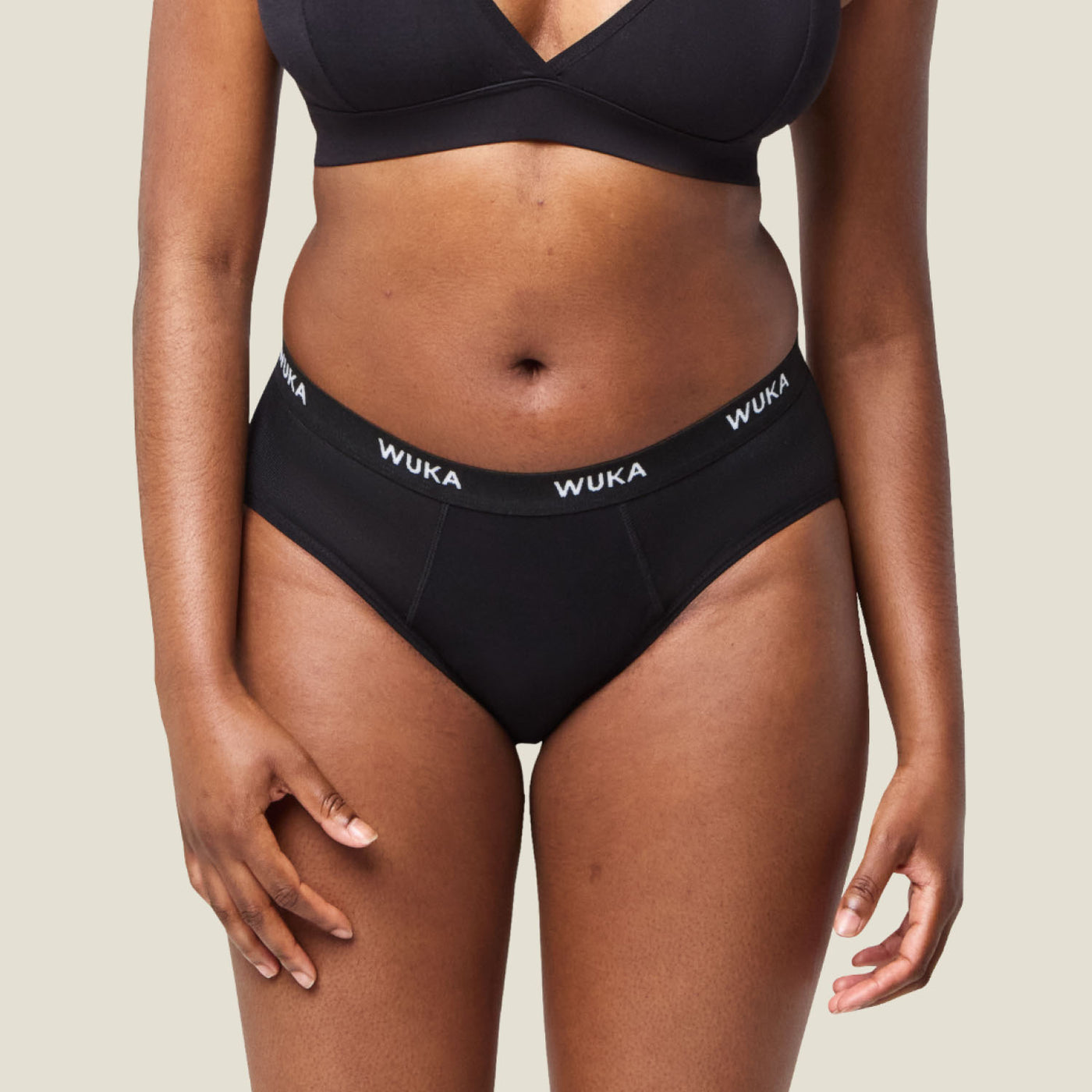 Front close-up of WUKA Midi Brief black period underwear showing soft, breathable fabric ideal for postpartum heavy and super heavy flows.