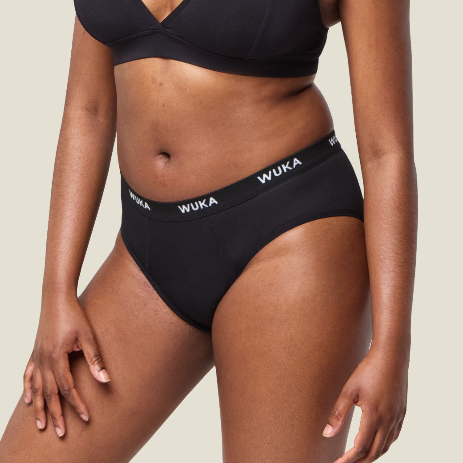 Side view of WUKA Ultimate™ Midi Brief Super Heavy Flow period knickers, showing secure fit and breathable mesh panel details.