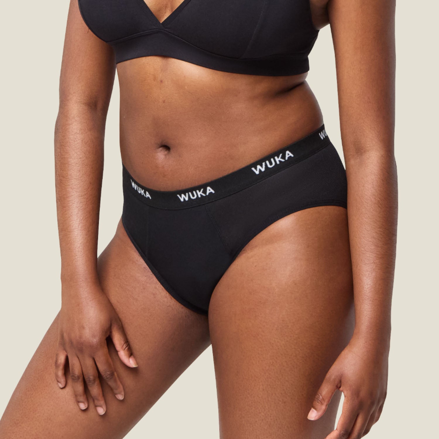Side view of WUKA Ultimate™ Midi Brief for heavy flow, showing the soft waistband and flexible fit for daily wear.