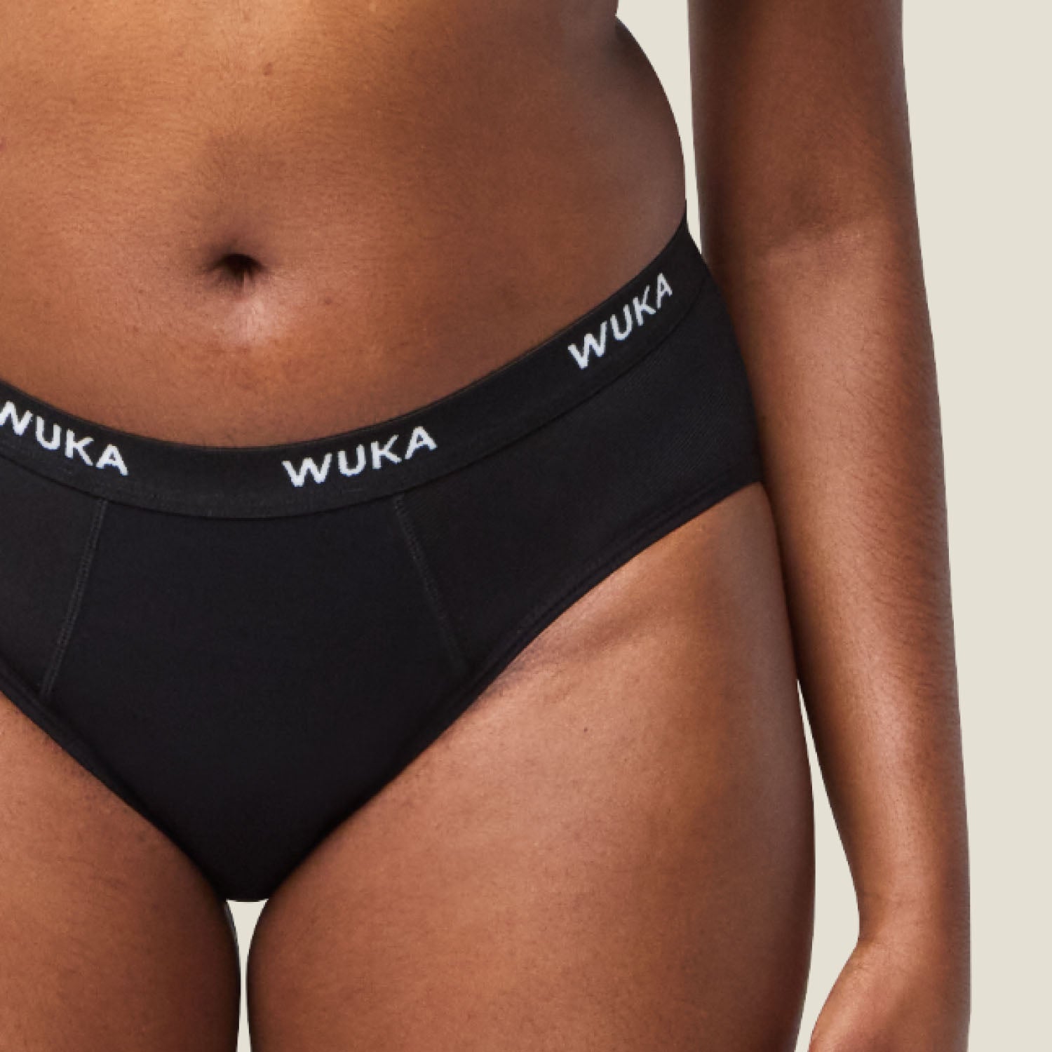 Zoomed-in detail of WUKA Ultimate™ Midi Brief Super Heavy Flow showing high-stretch waistband and moisture-wicking fabric for added comfort.