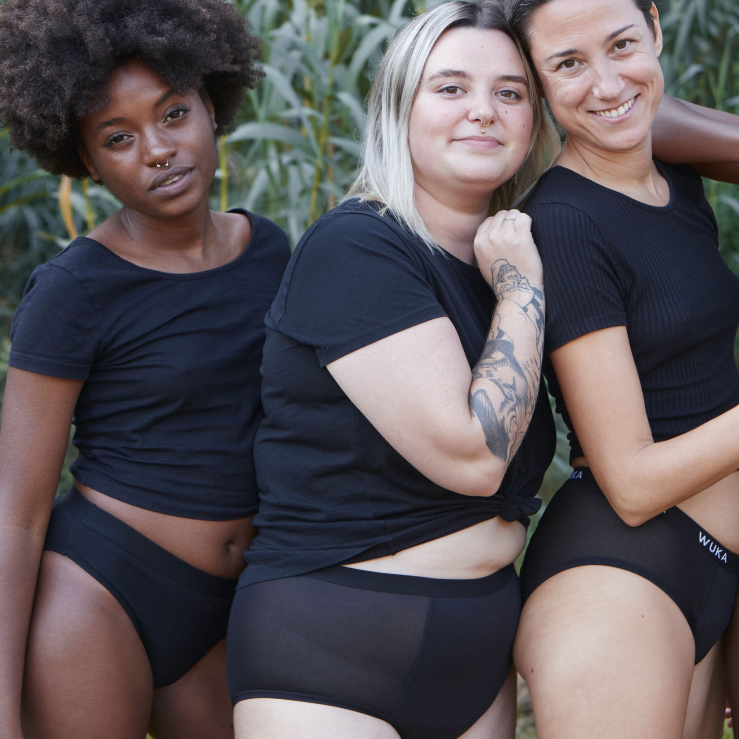 Group of diverse women wearing WUKA Ultimate™ High Waist Heavy Flow Period Pants – stylish, comfortable period protection for all body types.