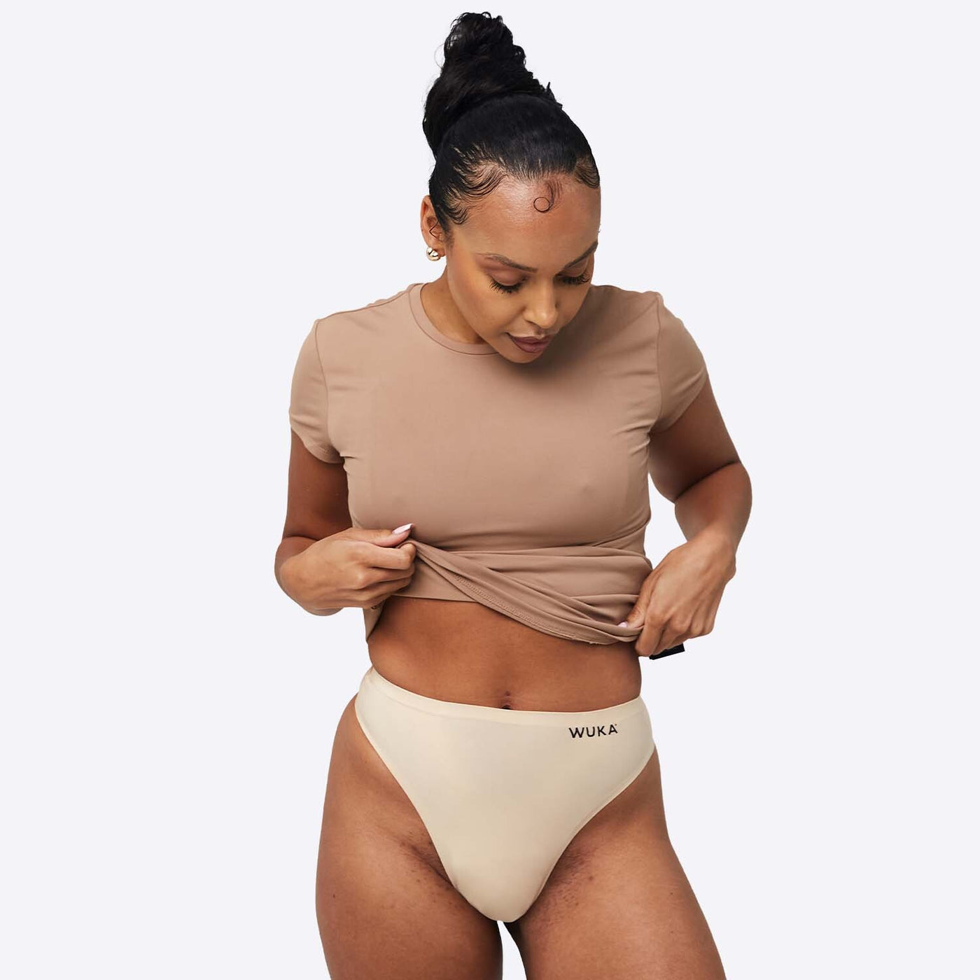 WUKA Stretch Thong Style Light to Medium Absorbency Light Nude Colour Front Size 1
