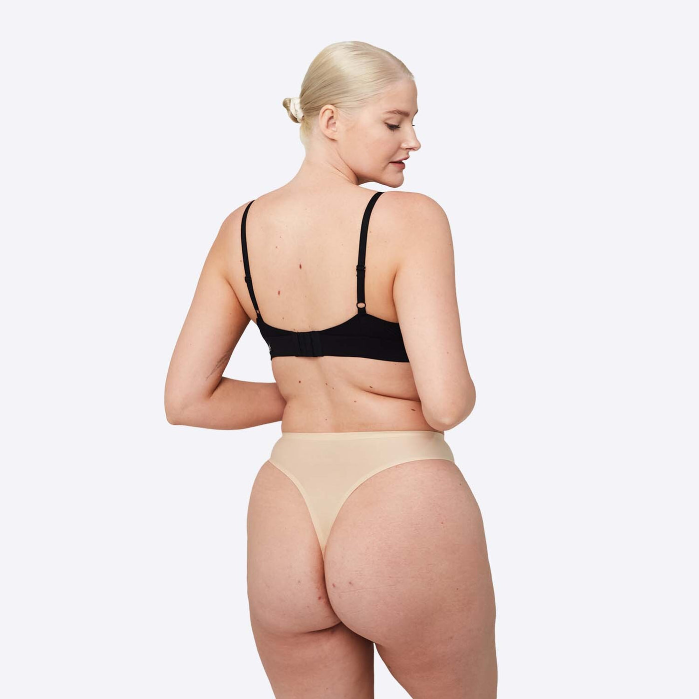WUKA Stretch Thong Style Light to Medium Absorbency Light Nude Colour Back Size 2